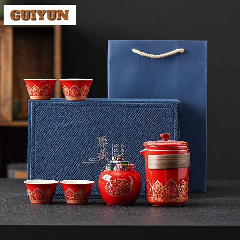 Service à thé comprenant une théière et quatre tasses, un coffret cadeau premium. Service en porcelaine chinoise de luxe...