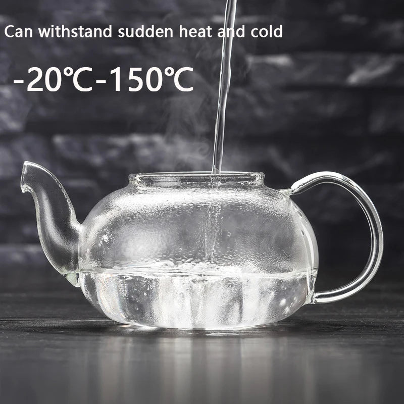 Théière en verre transparent de 400 ml avec infuseur, compatible avec les plaques de cuisson. Résistante à la chaleur.